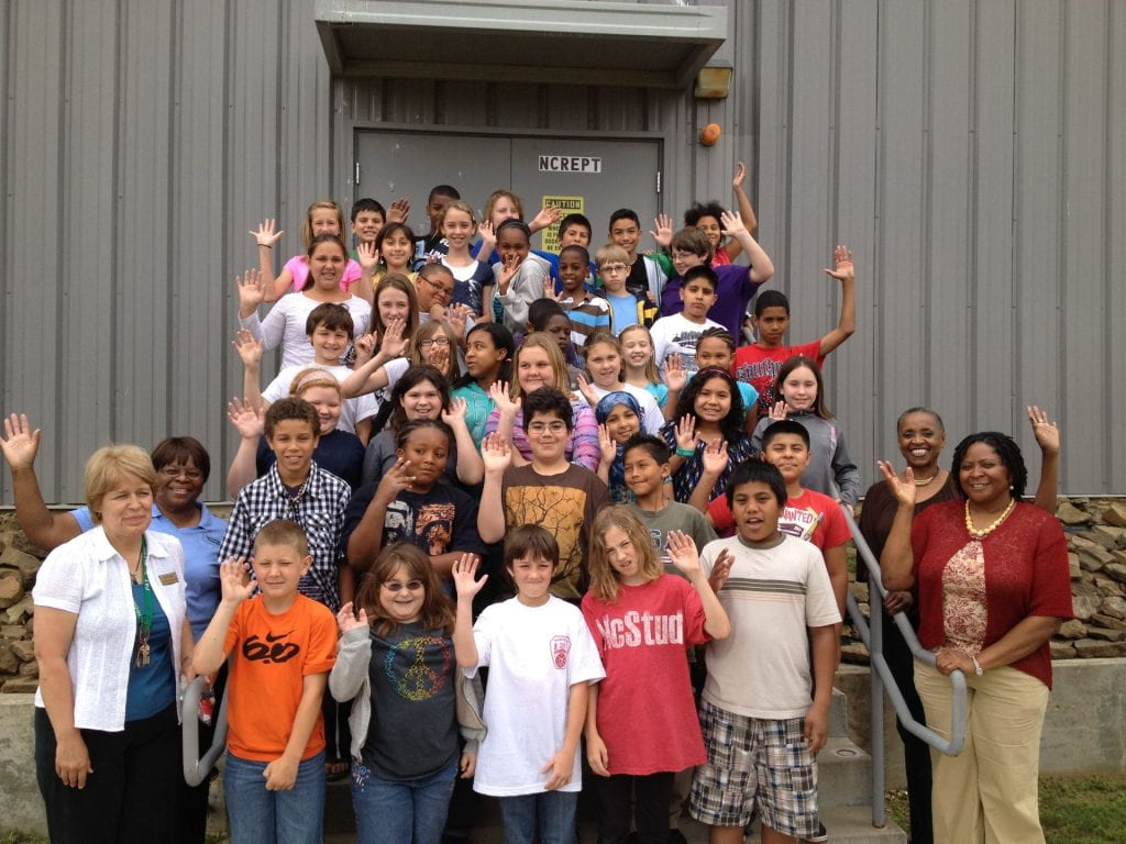 Elementary/Middle school students with teachers in front of NCREPT for a tour.